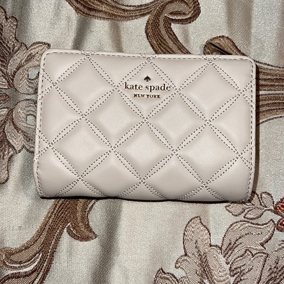kate spade Handbags - Brand new Kate spade Natalia medium bifold wallet.